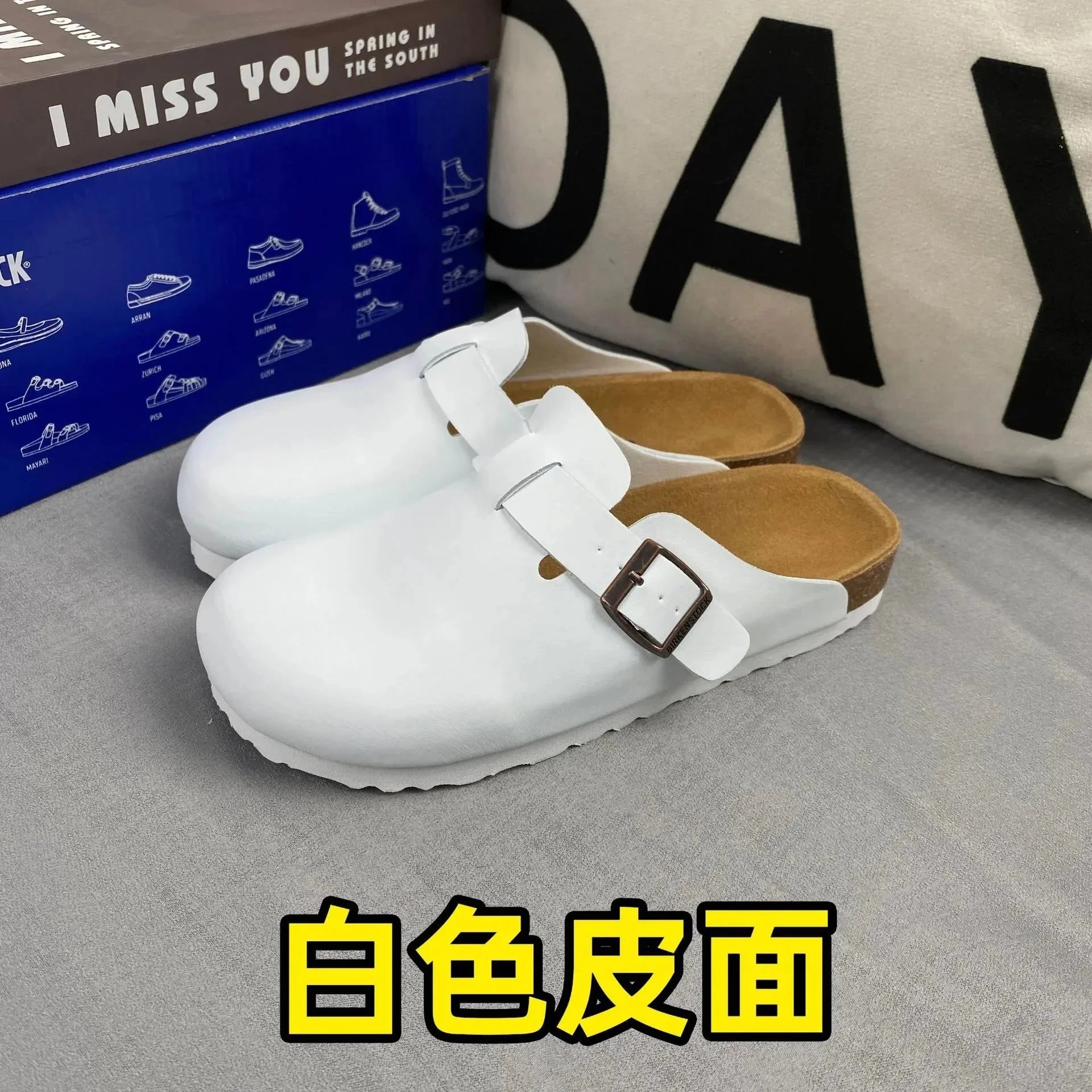 Variant image · White leather slippers